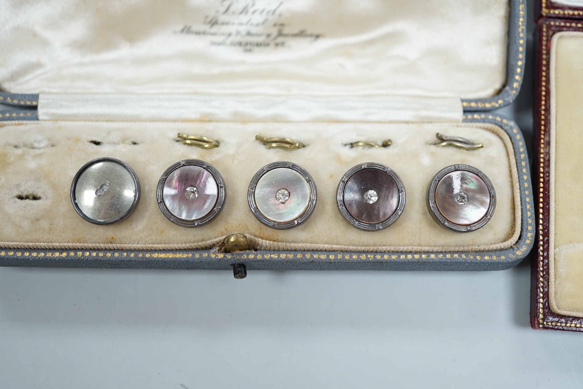 Two cased part dress stud sets, including 9ct and mother of pearl.